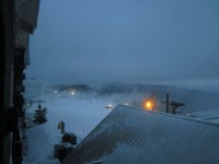 Skidder at 6:52am with groomers and snow-making